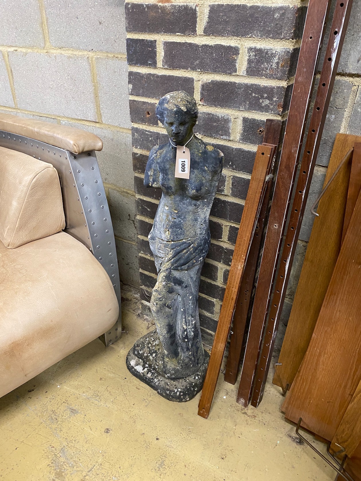 A reconstituted stone garden ornament, height 90cm